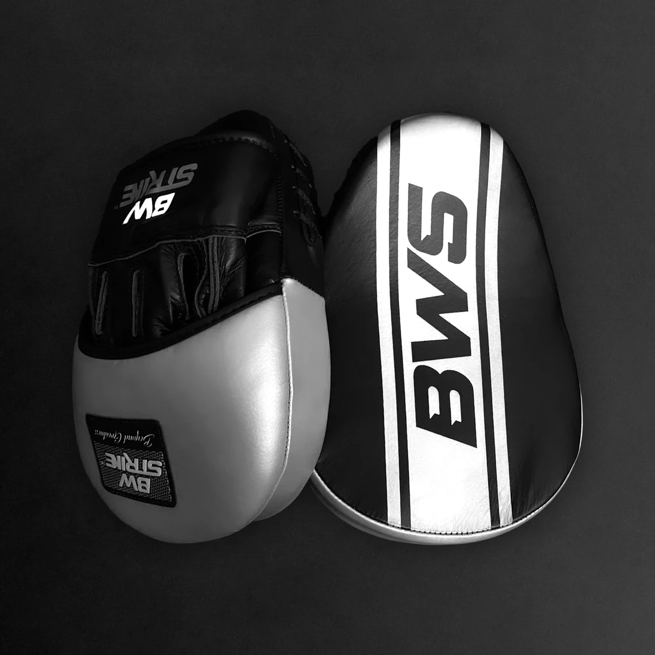 BW Strike product photography — Black and white protective pads