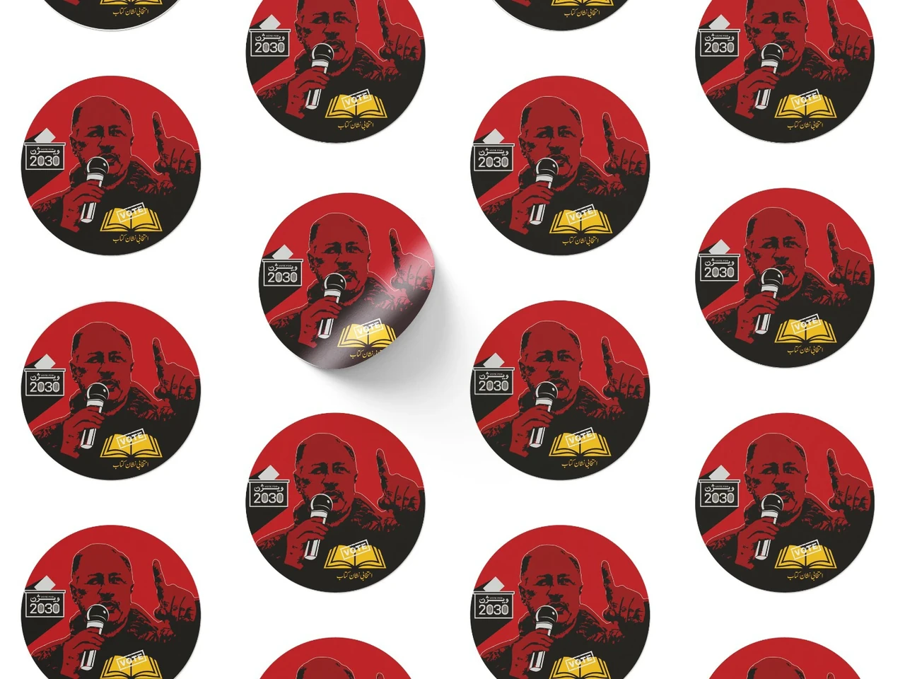 Circular campaign stickers featuring the manifesto artwork
