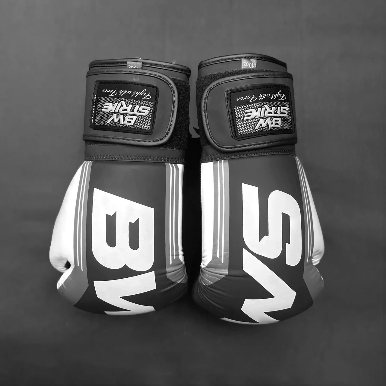 BW Strike product photography — Front-facing monochrome glove pair