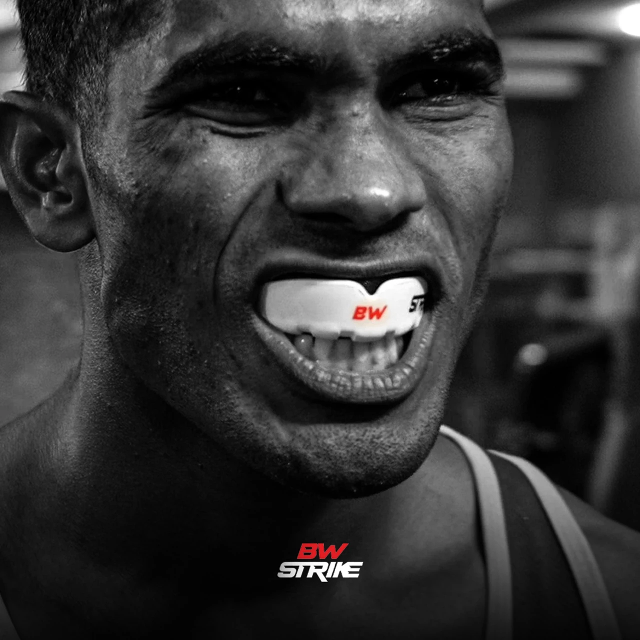 BW Strike product photography — Monochrome mouthguard portrait
