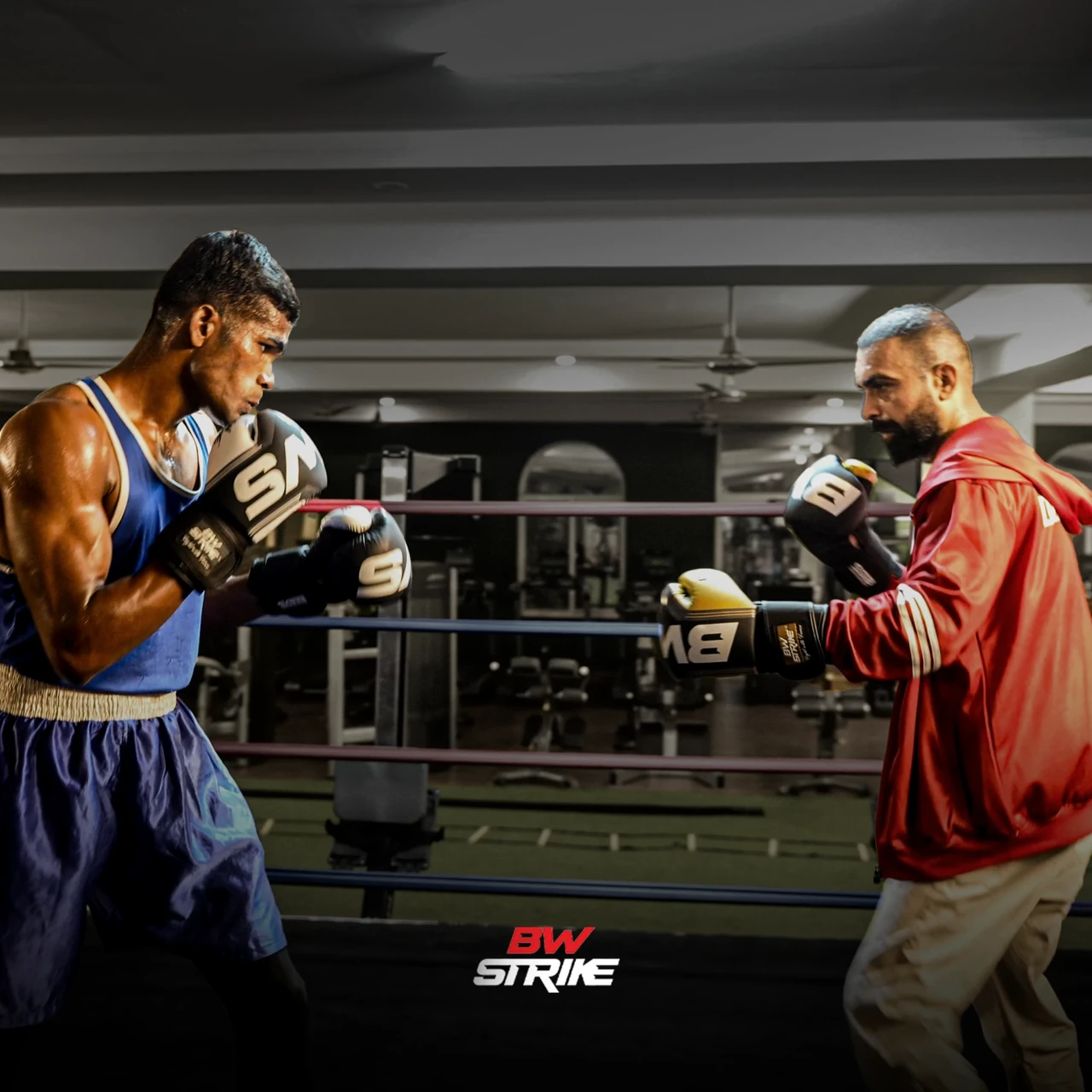 BW Strike product photography — Boxing training with coach