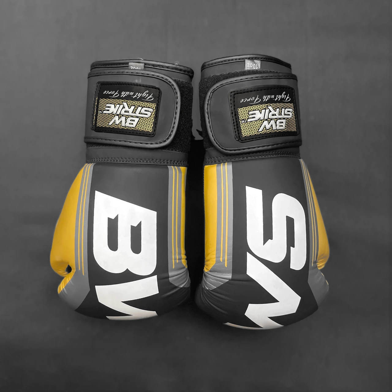 BW Strike product photography — Front-facing yellow glove pair