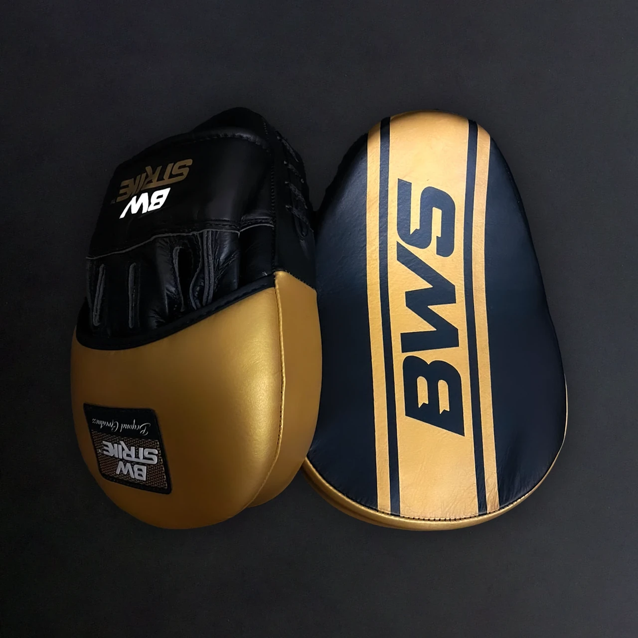 BW Strike product photography — Black and yellow protective pads