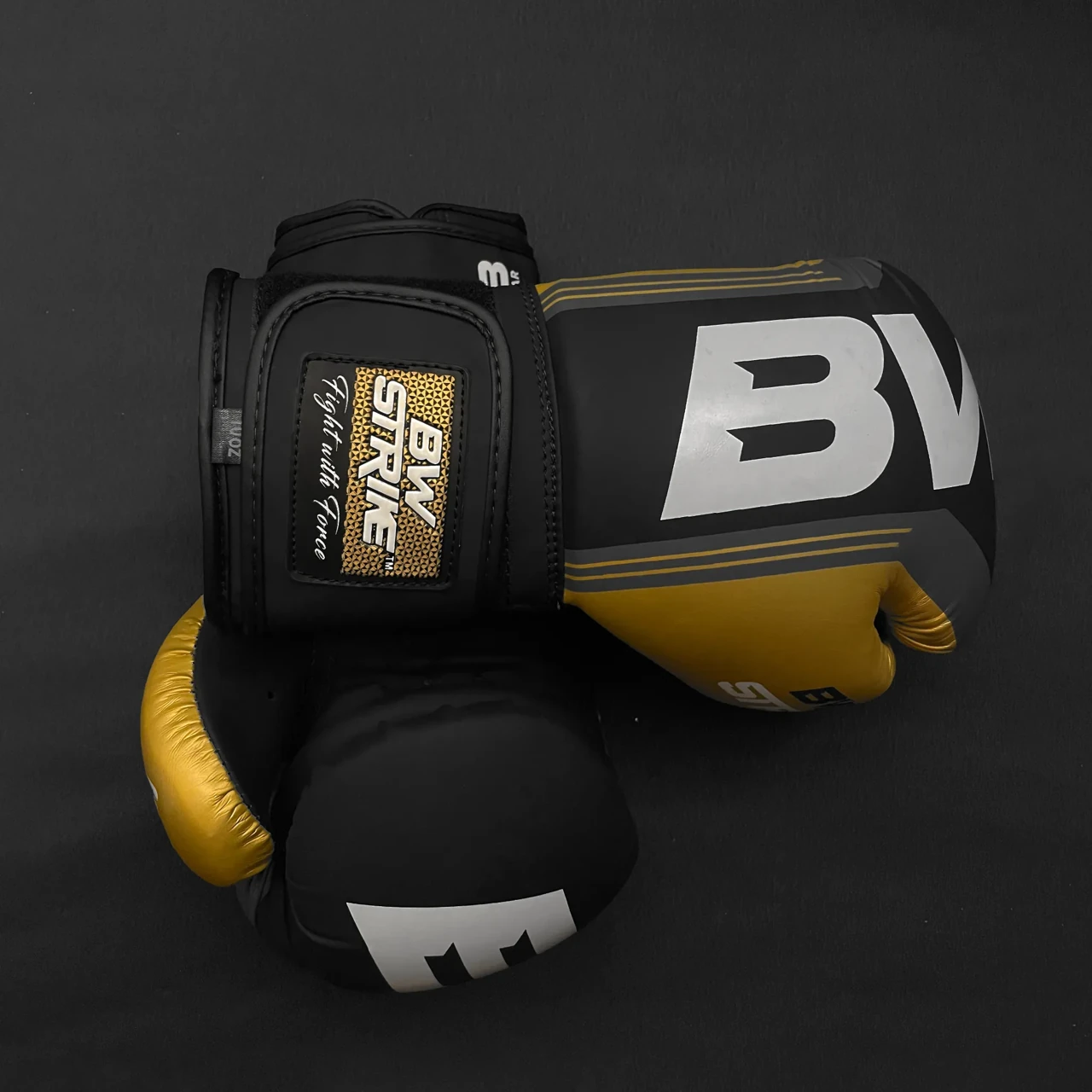 BW Strike product photography — Yellow glove product arrangement