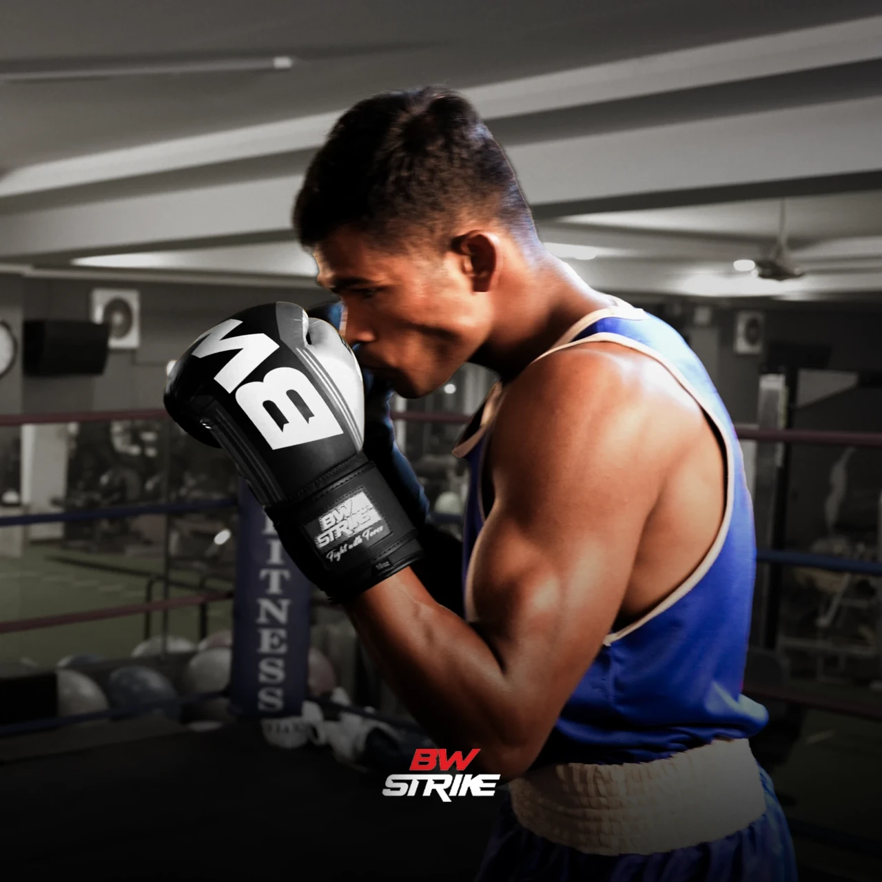 BW Strike product photography — Boxer wearing black gloves